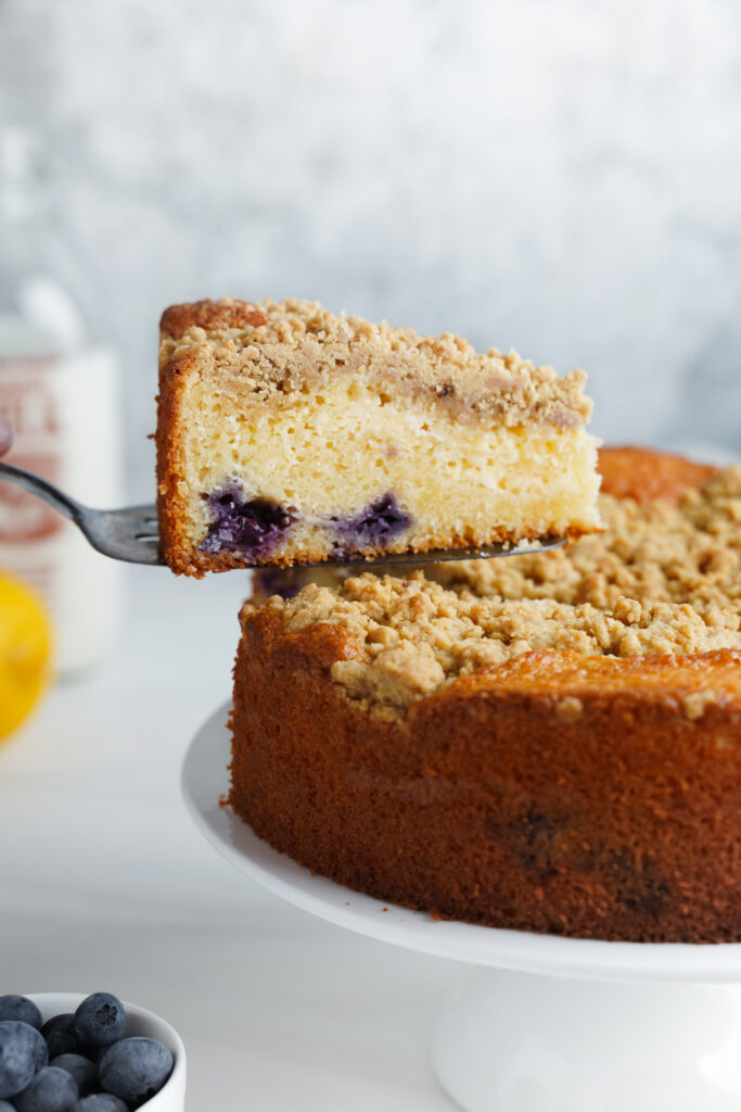 Slice of lemon blueberry cake | cookingwithcassandra.com