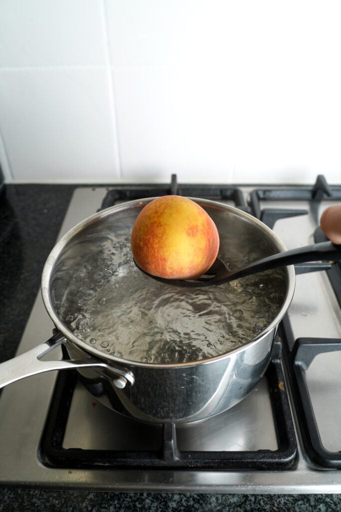 Blanch Peaches in water | cookingwithcassandra.com