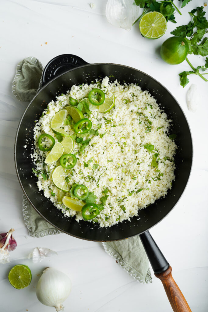 Cilantro lime cauliflower rice with slices of lemon