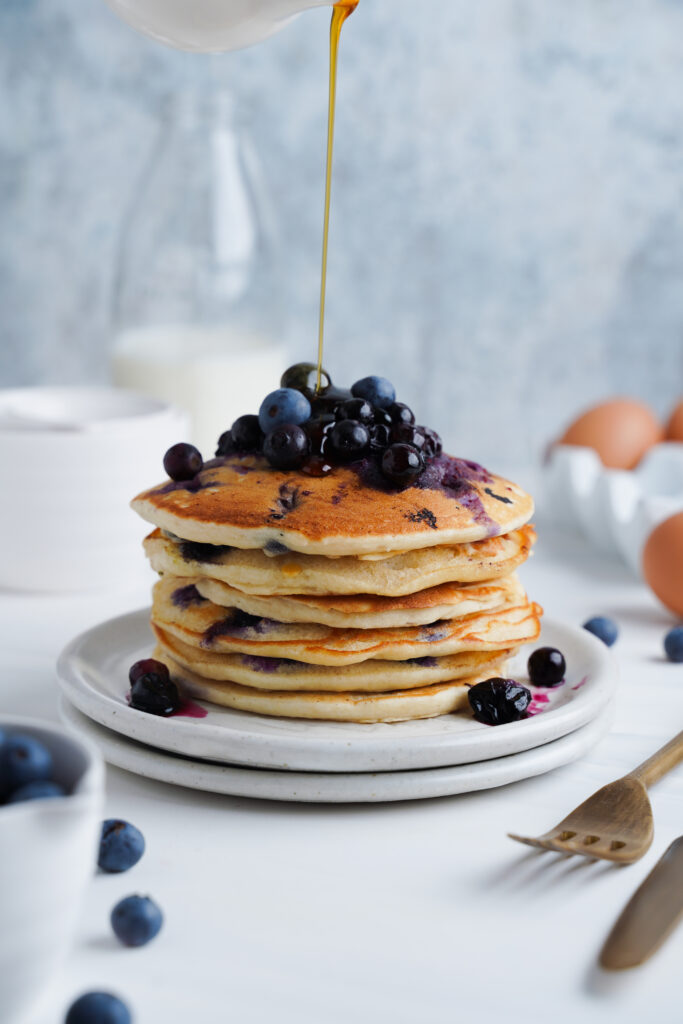 Pancakes topped with syrup and blueberries | cookingwithcassandra.com