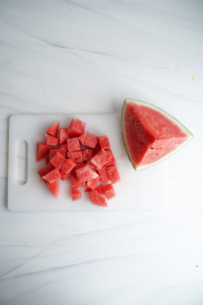 Sliced watermelon on a chopping board | cookingwithcassandra.com